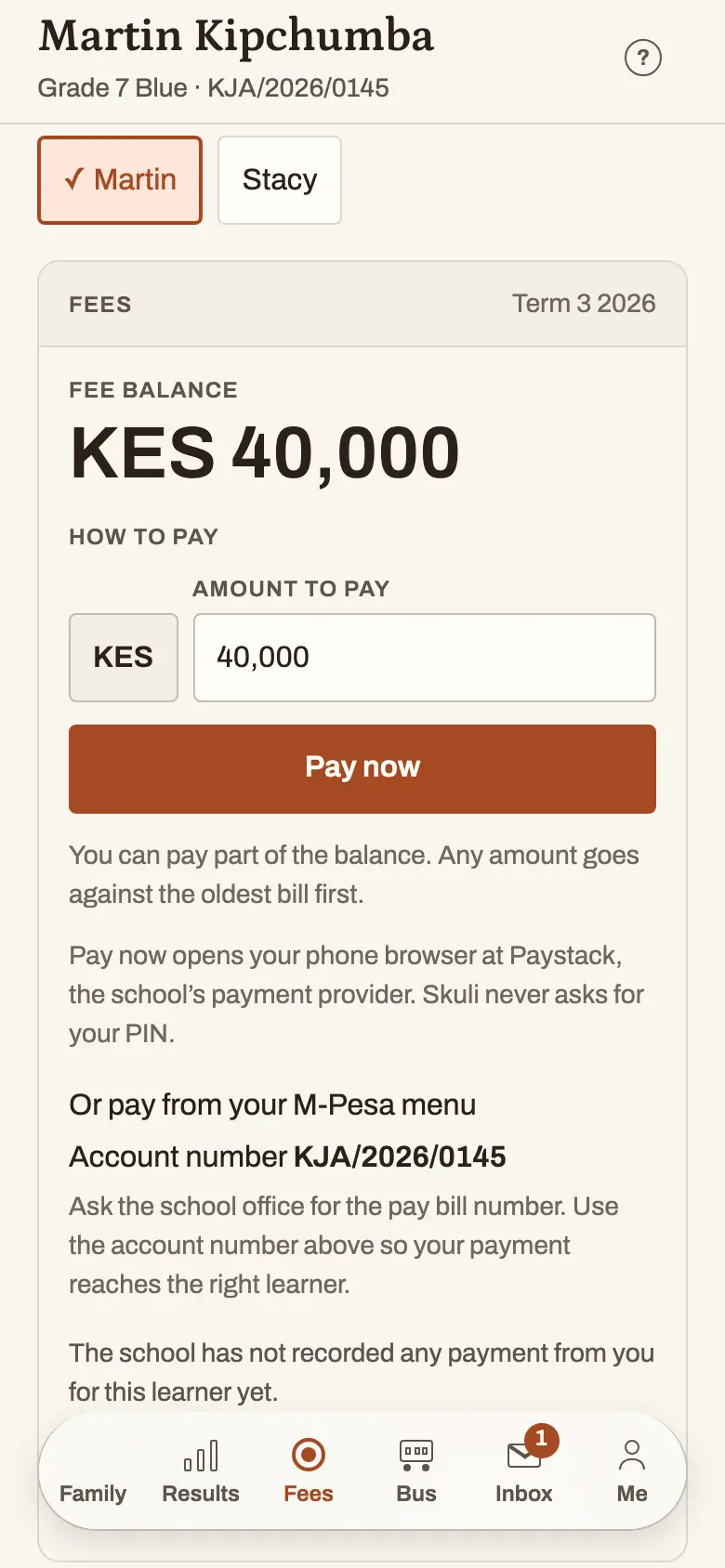 The parent's Fees screen for one child: the balance, an amount to pay with a Pay now button, and the M-Pesa account number to use instead.